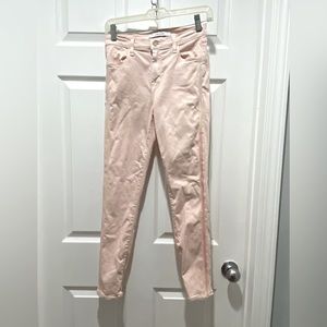 J Brand light pink stretch jeans with side color strip.